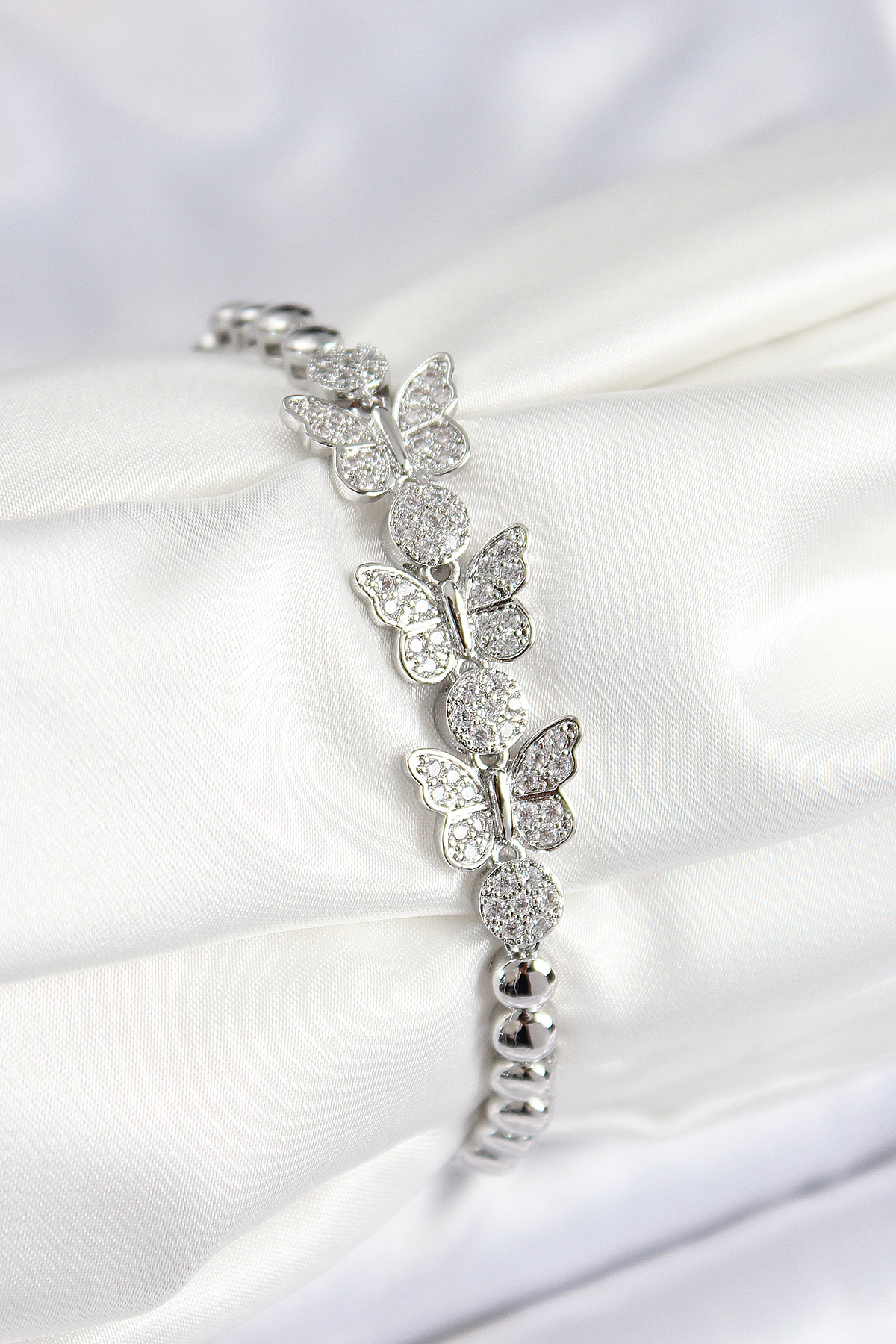 Pirinç Zirkon Taşlı Kelebek Model Gümüş Renk Kadın Bileklik