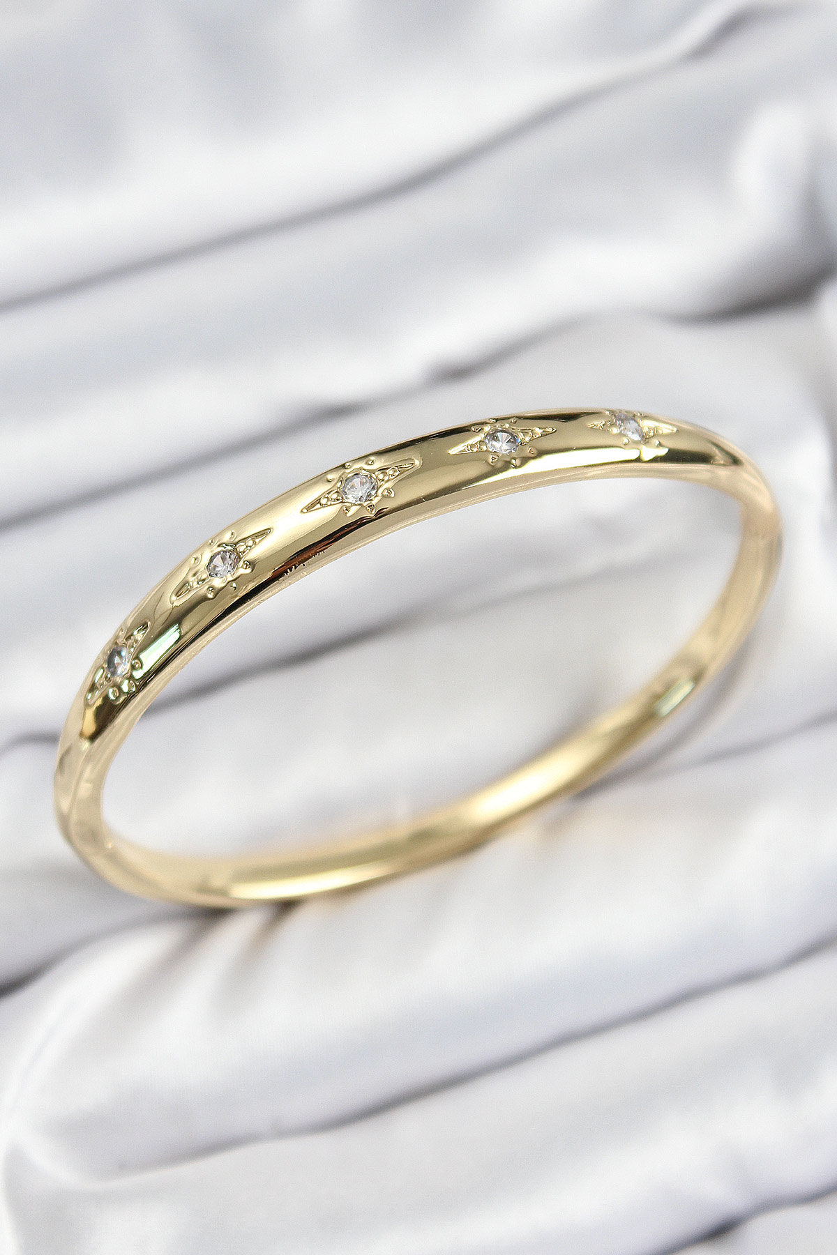 Pirinç Zirkon Taşlı Kutup Yıldızı Model Gold Renk Kadın Kelepçe