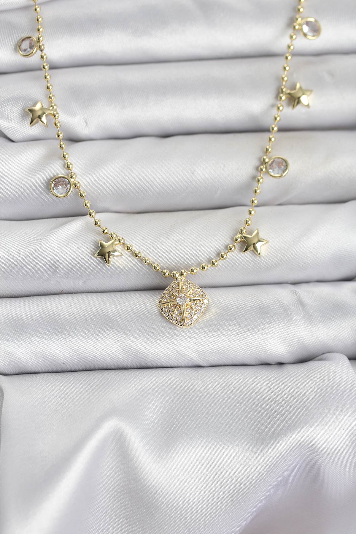 Pirinç Gold Renk Zirkon Taşlı Kutup Yıldızı Model Kadın Kolye
